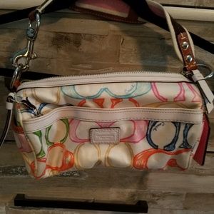 Never used multi colored Coach purse